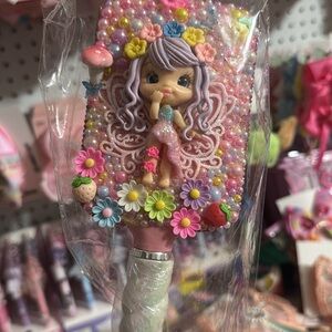 Pink and Purple Floral Hair Accessory decorated combs